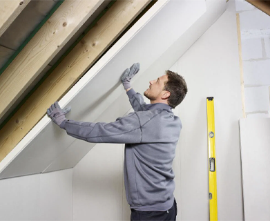 Plasterboard is then placed over wall insulation